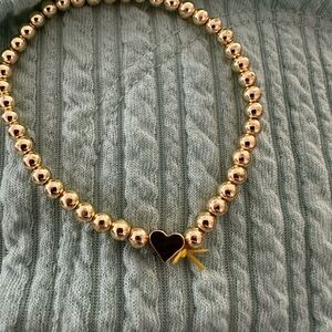Gold and Black Charm Bracelet